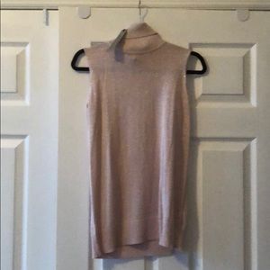 Pink sleeveless turtleneck